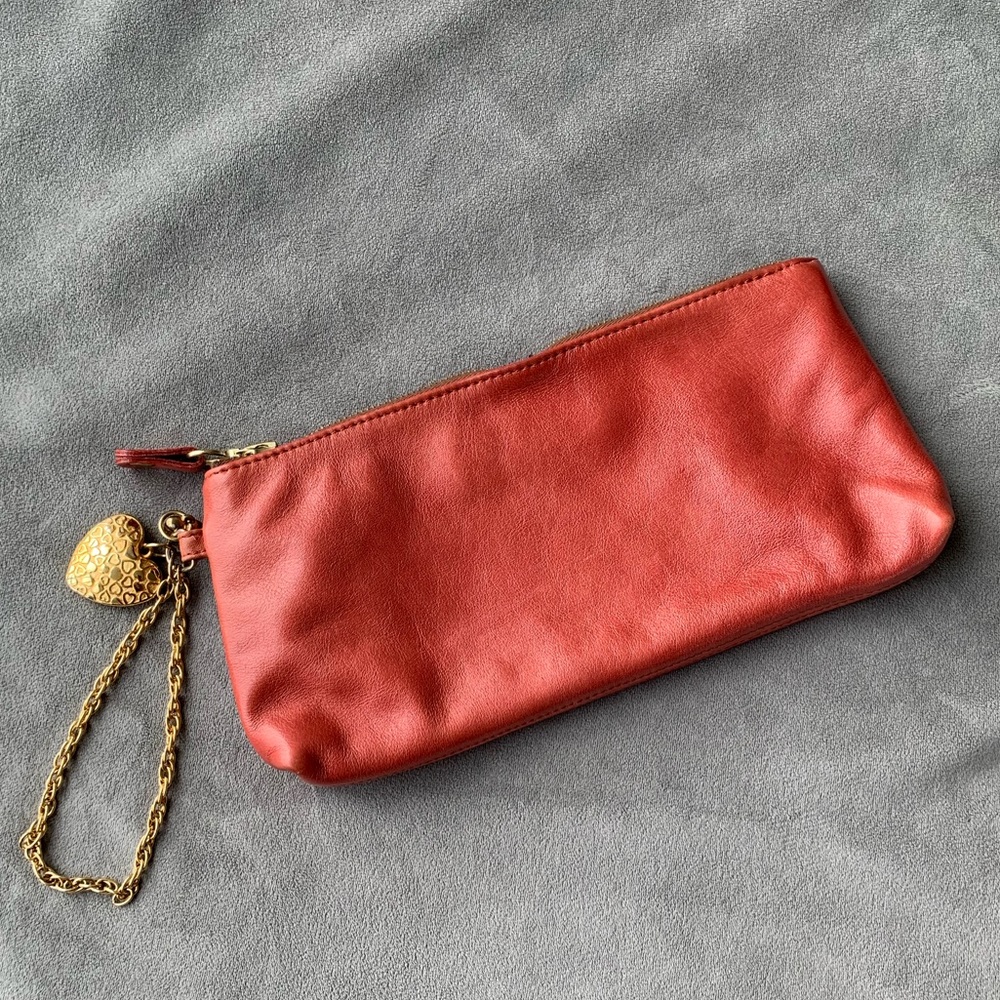 Cara Landy leather wristlet with chain in coral